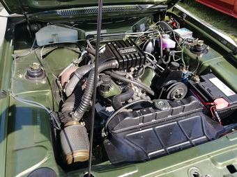 Turbo May Motor mit 4-eckigem Luftsammler
Turbo May engine with 4-cornered air collector
Moteur Turbo May avec collecteur d'air  4 pans